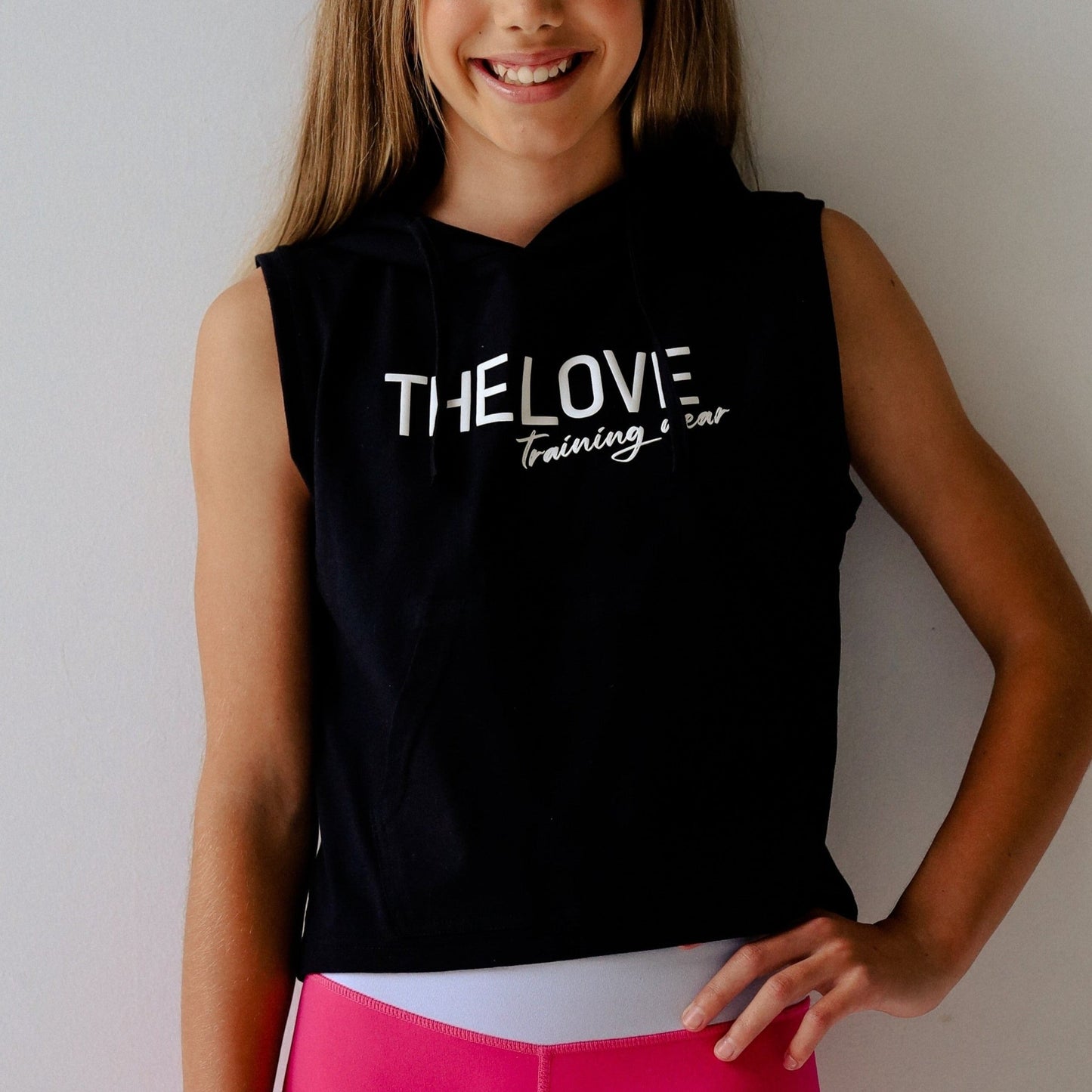 Black Sleeveless Hoodie - The Love Training Wear. Easy to wear sleeveless hoodie for girls. Size 6 - 16.  Brisbane Qld.